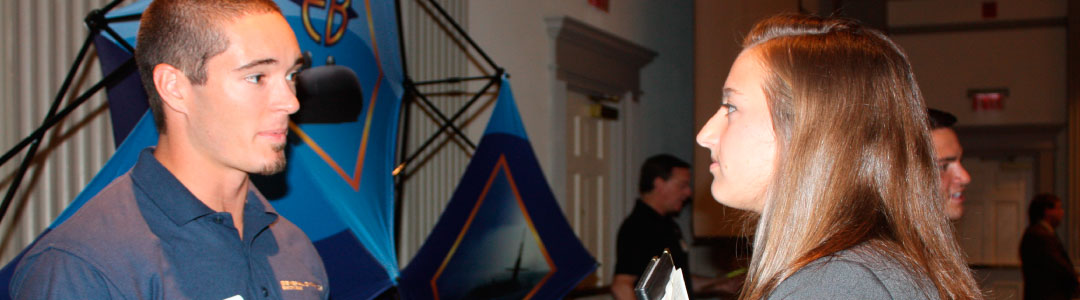 Photo of a recruiter talking to a student